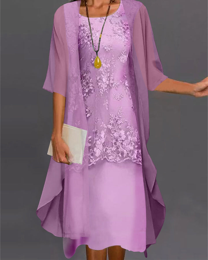 Plus size elegant smock dress for women, with charming lace details & 3/4 sleeves. Ideal spring/summer outfit.