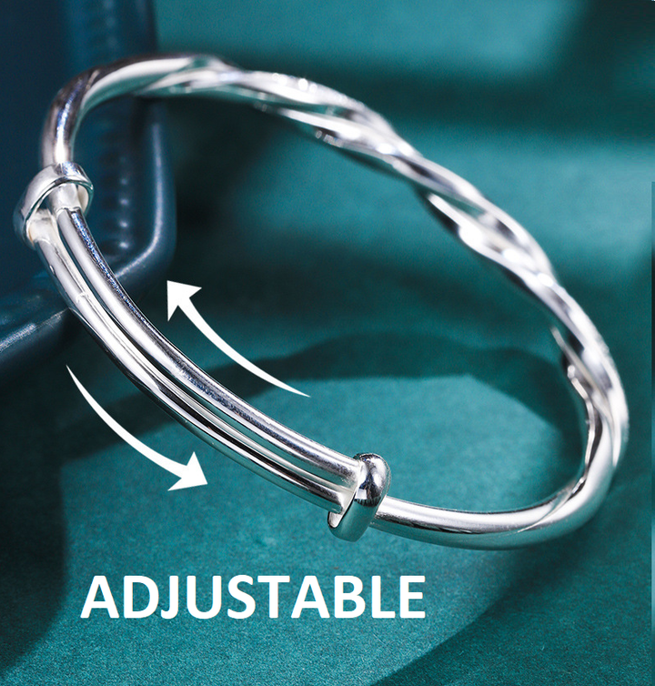 Adjustable sterling silver bracelet for women, featuring an intricate design, a versatile accessory.