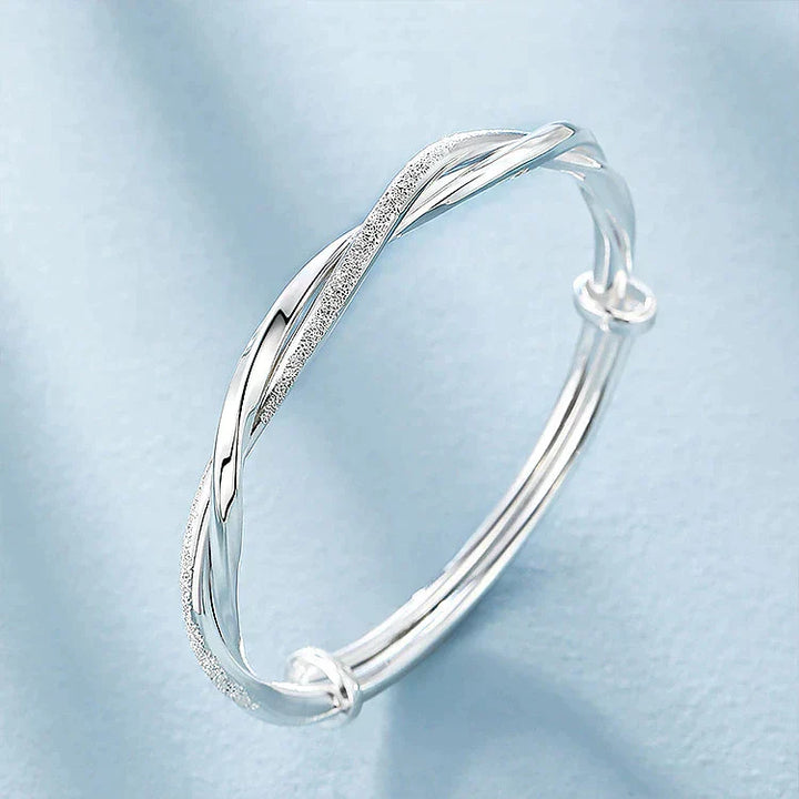 Chic women's sterling silver bracelet, an elegant and intricate fashion accessory for modern style.