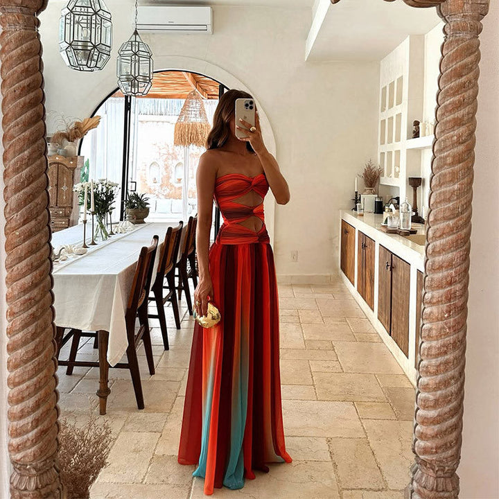 Stylish women's strapless red formal maxi dress, an elegant long evening gown suitable for any special event.