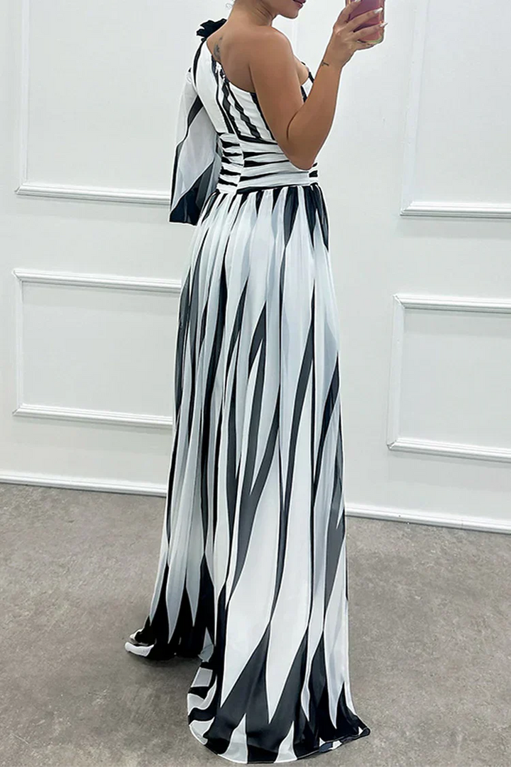 Women's asymmetrical striped maxi dress with an elegant one-shoulder design, long and flowy for summer fashion.