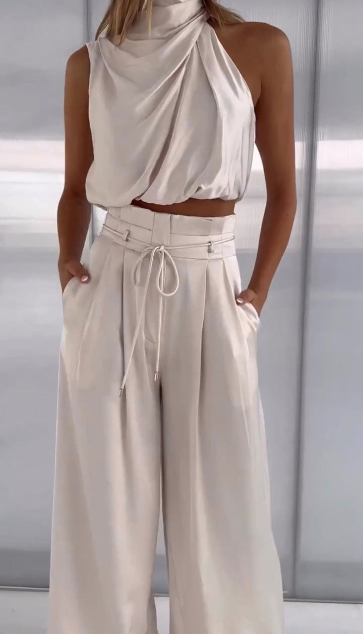 Elegant women's two-piece lounge set in soft cotton linen, perfect for comfortable casual wear.