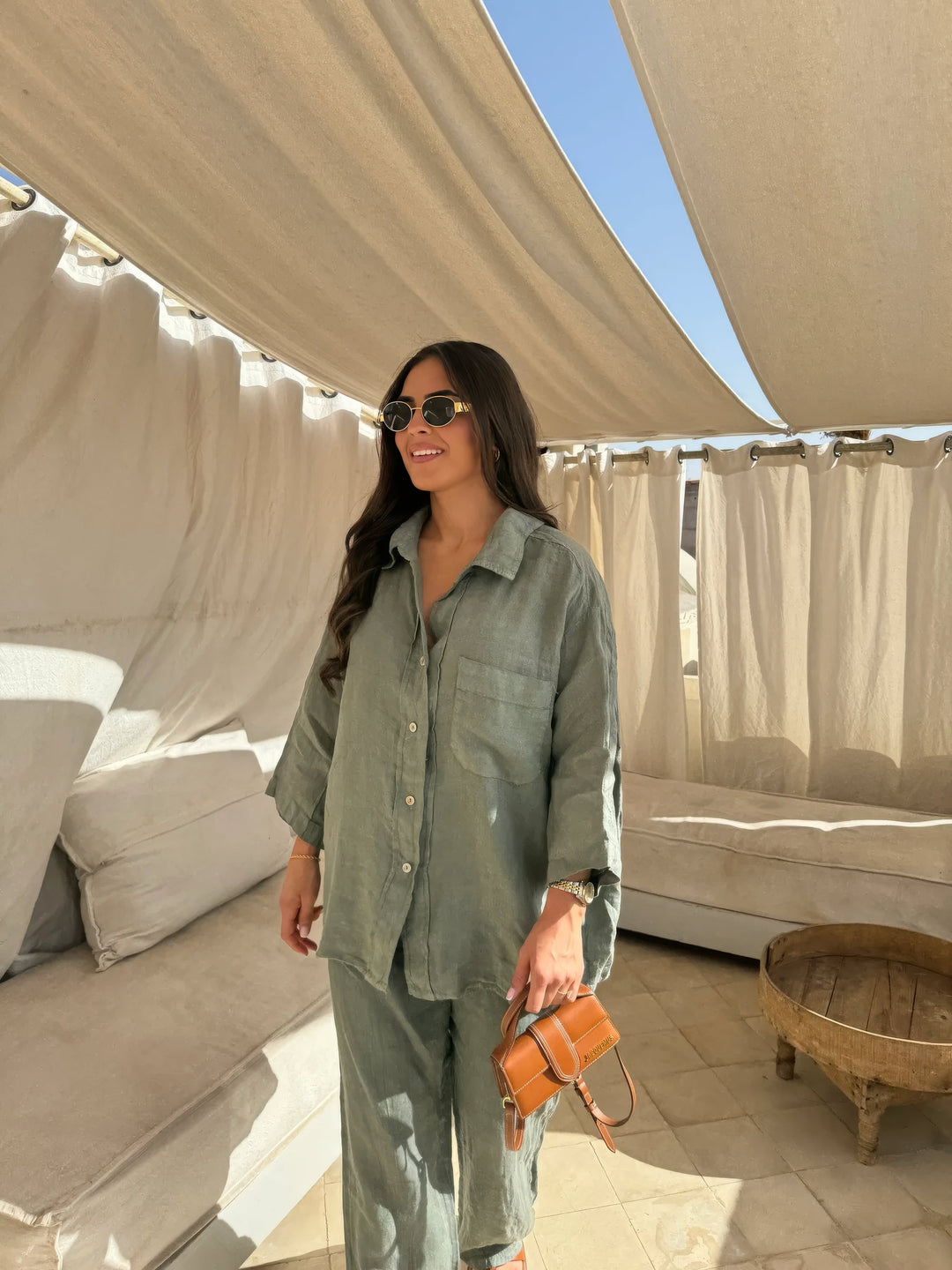 Elegant women's matching set: long sleeve top & wide leg pants. Comfortable two-piece loungewear for summer.