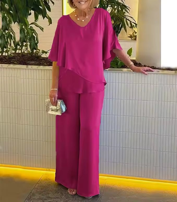 Modern women's elegant two-piece set with flowing trousers, offering a comfortable and stylish chic ensemble.