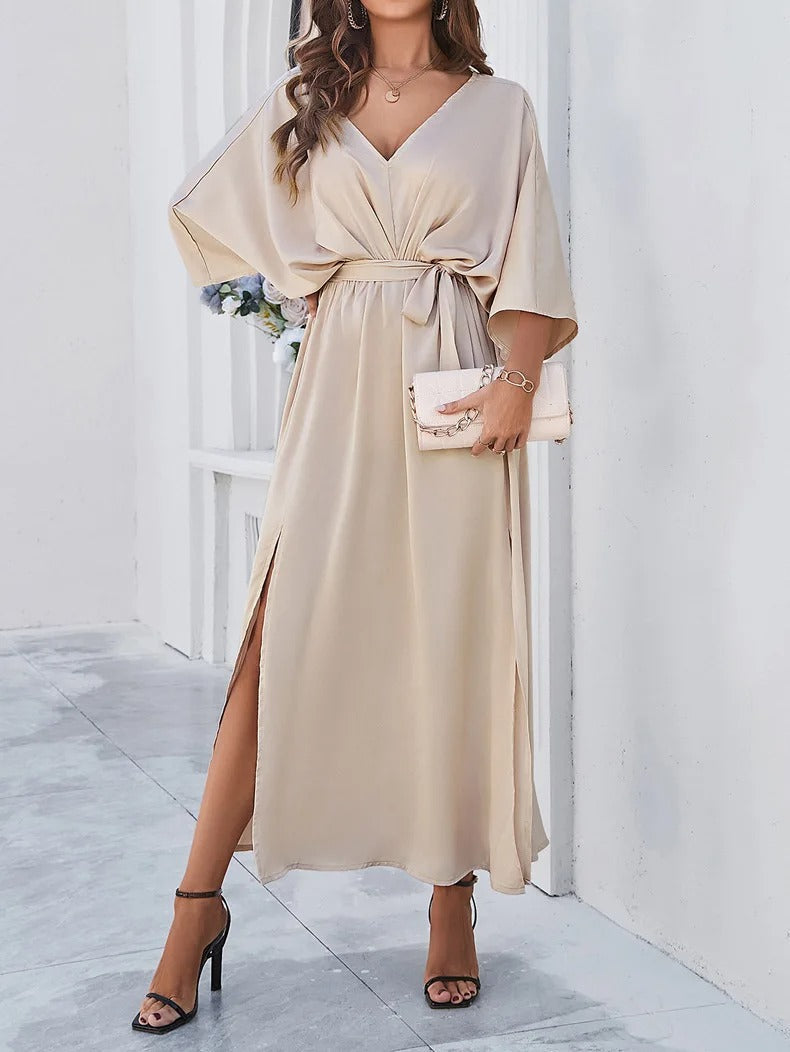 Elegant women's V-neck maxi dress. Flowy spring fashion for effortless style. Perfect long dress for any occasion.