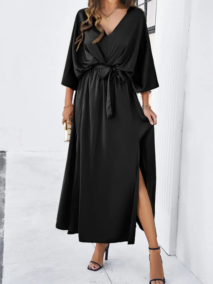 Stylish women's V-neck maxi dress. Elegant design and flowy fabric make it a perfect spring & summer apparel.