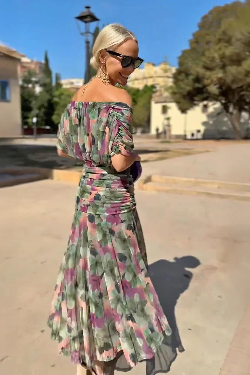 Women's elegant V-neck fantasy print maxi party dress, a flowing and flattering sophisticated design.