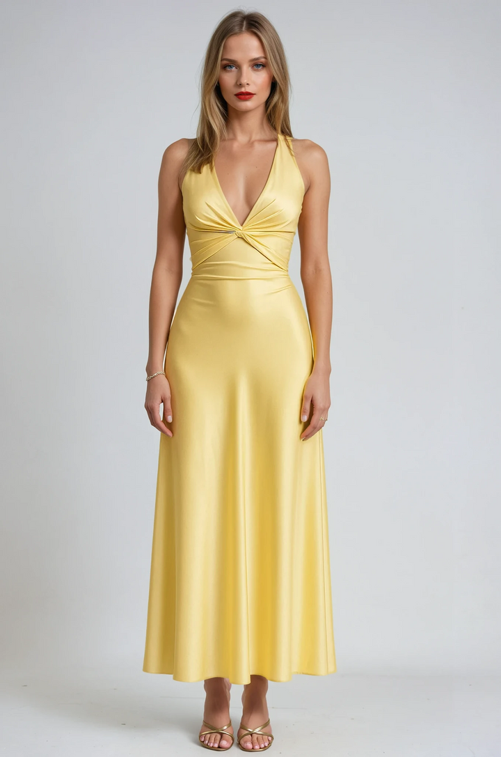 Elegant women's vibrant yellow halter maxi prom dress. Perfect for formal events, evening wear & special occasions.
