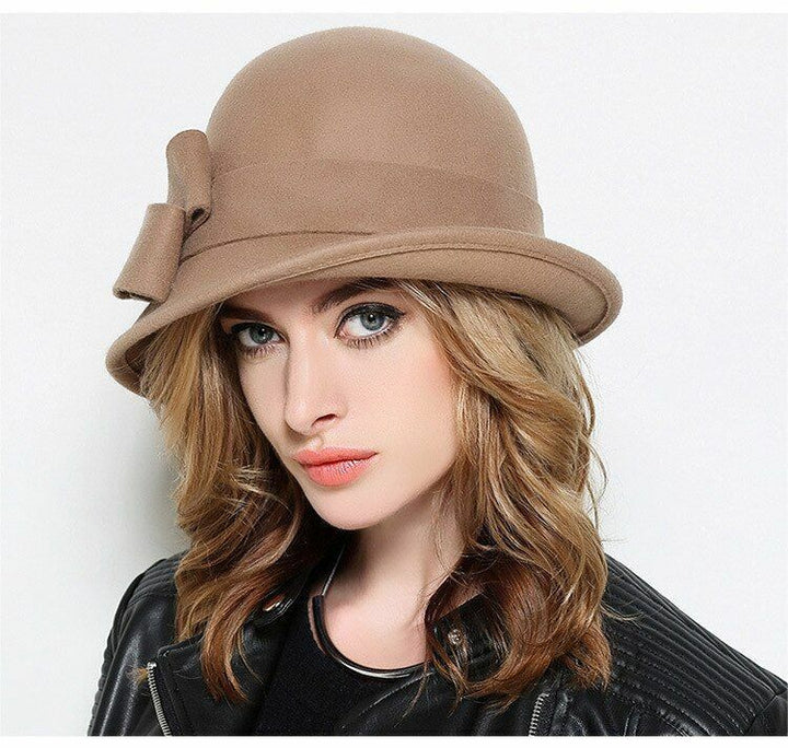 Women's vintage wool fedora hat with a sophisticated ribbon, enhancing any outfit with classic winter style.