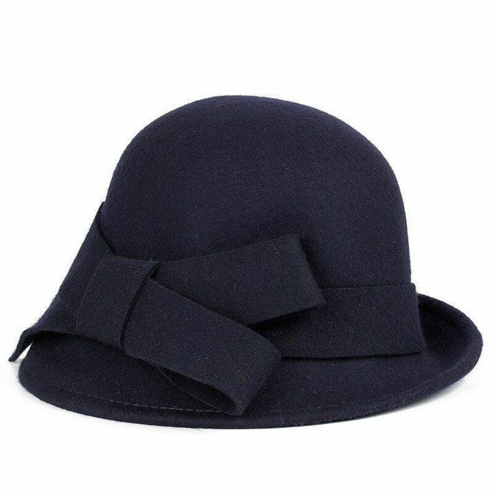 Chic women's wool fedora hat with vintage charm & a stylish ribbon, a versatile and elegant accessory for fall/winter.