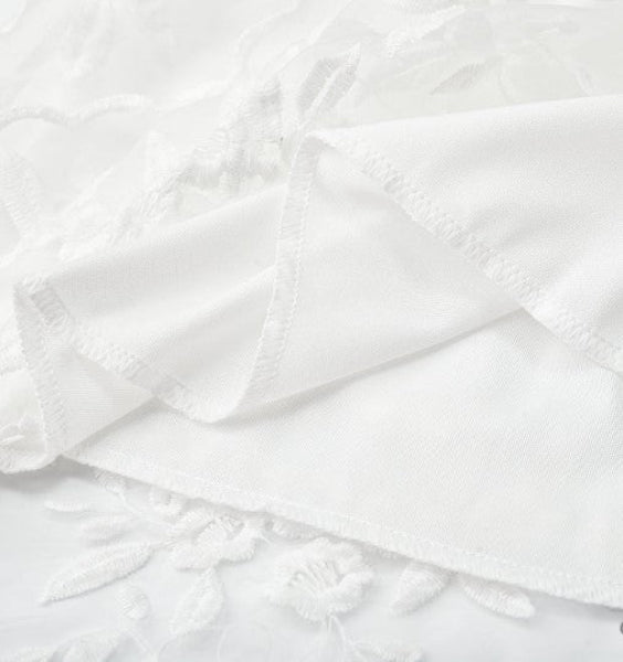Lightweight women's white halter mini dress, a chic V-neck cocktail or beach party dress for warm weather.