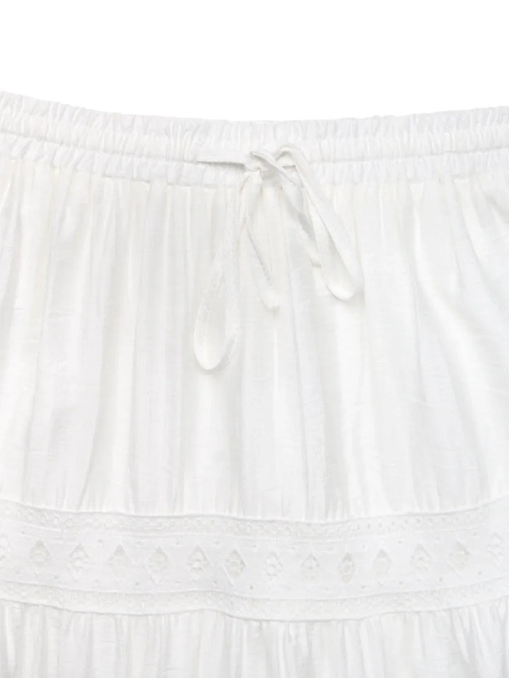 Elegant women's white lace maxi skirt with a graceful flow. Perfect long skirt for summer & upscale casual wear.
