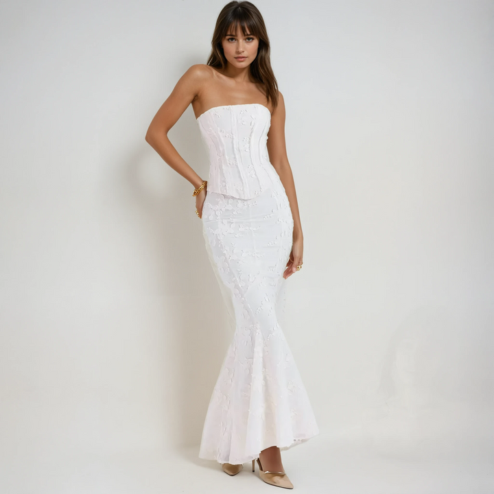 Elegant women's white strapless embroidered maxi dress, perfect for weddings or formal evening events.