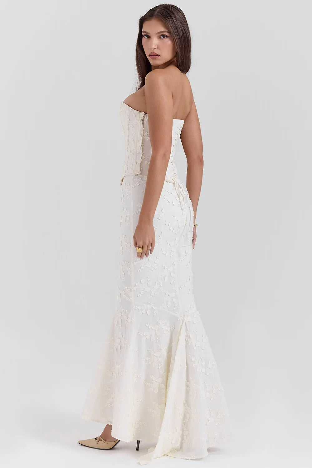 Chic women's embroidered strapless maxi dress, a versatile white evening gown for special occasions.