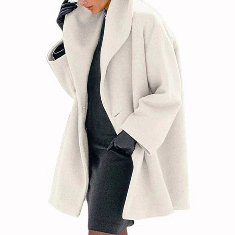 Elegant women's wool jacket, insulated for winter warmth. Chic button-down, hip-length outerwear for ladies fashion.
