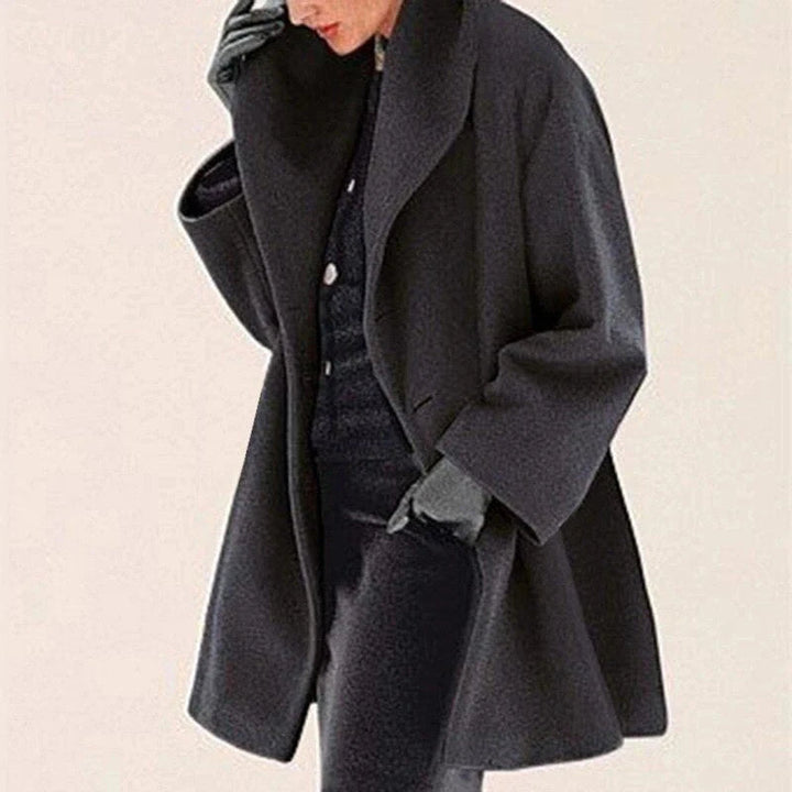 Elegant women's wool winter jacket, warm and chic. Insulated, button-down, hip-length outerwear for ladies.