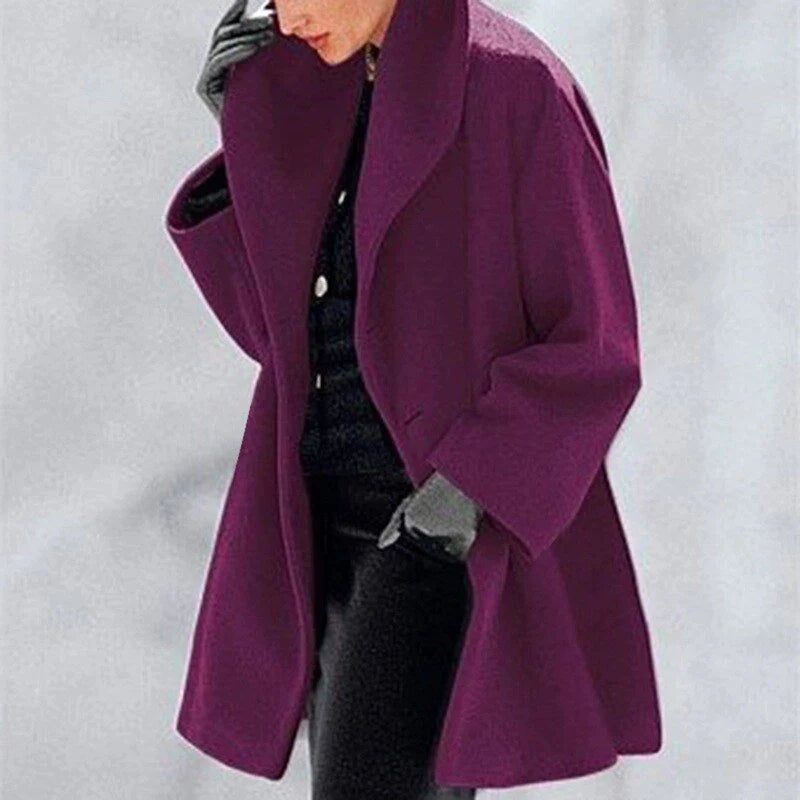 Warm women's wool winter coat, elegant and insulated. Chic button-down, hip-length jacket for seasonal ladies fashion.