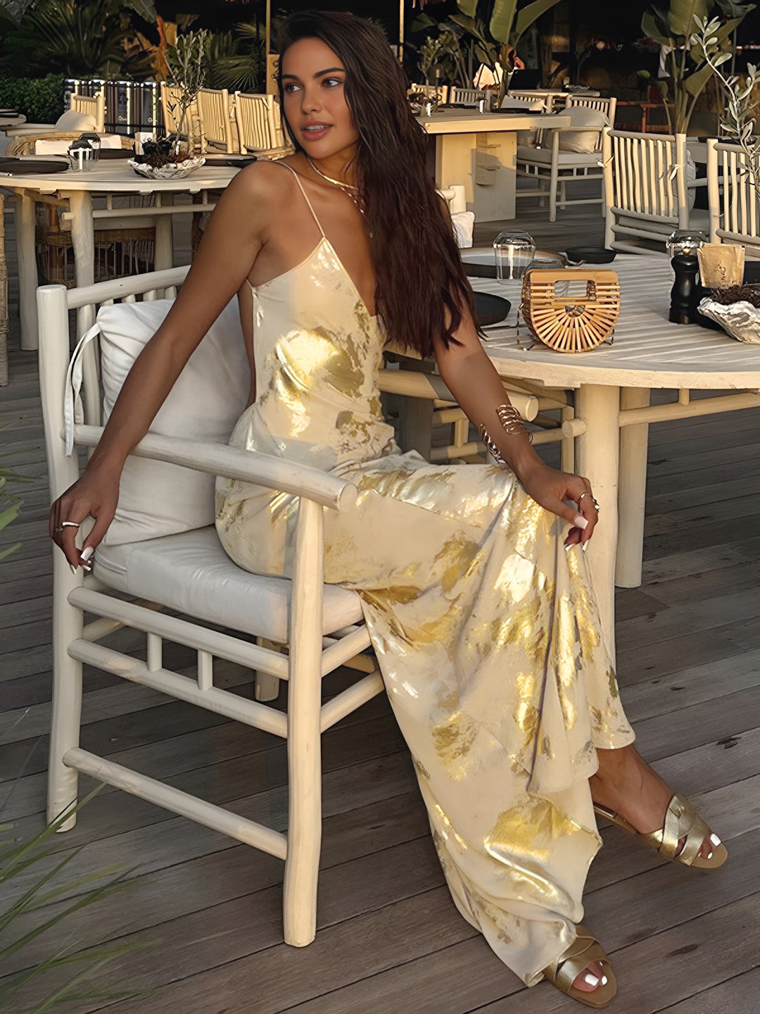 Flowing yellow gold slip maxi dress for women, featuring a beautiful floral pattern. Perfect elegant evening wear.