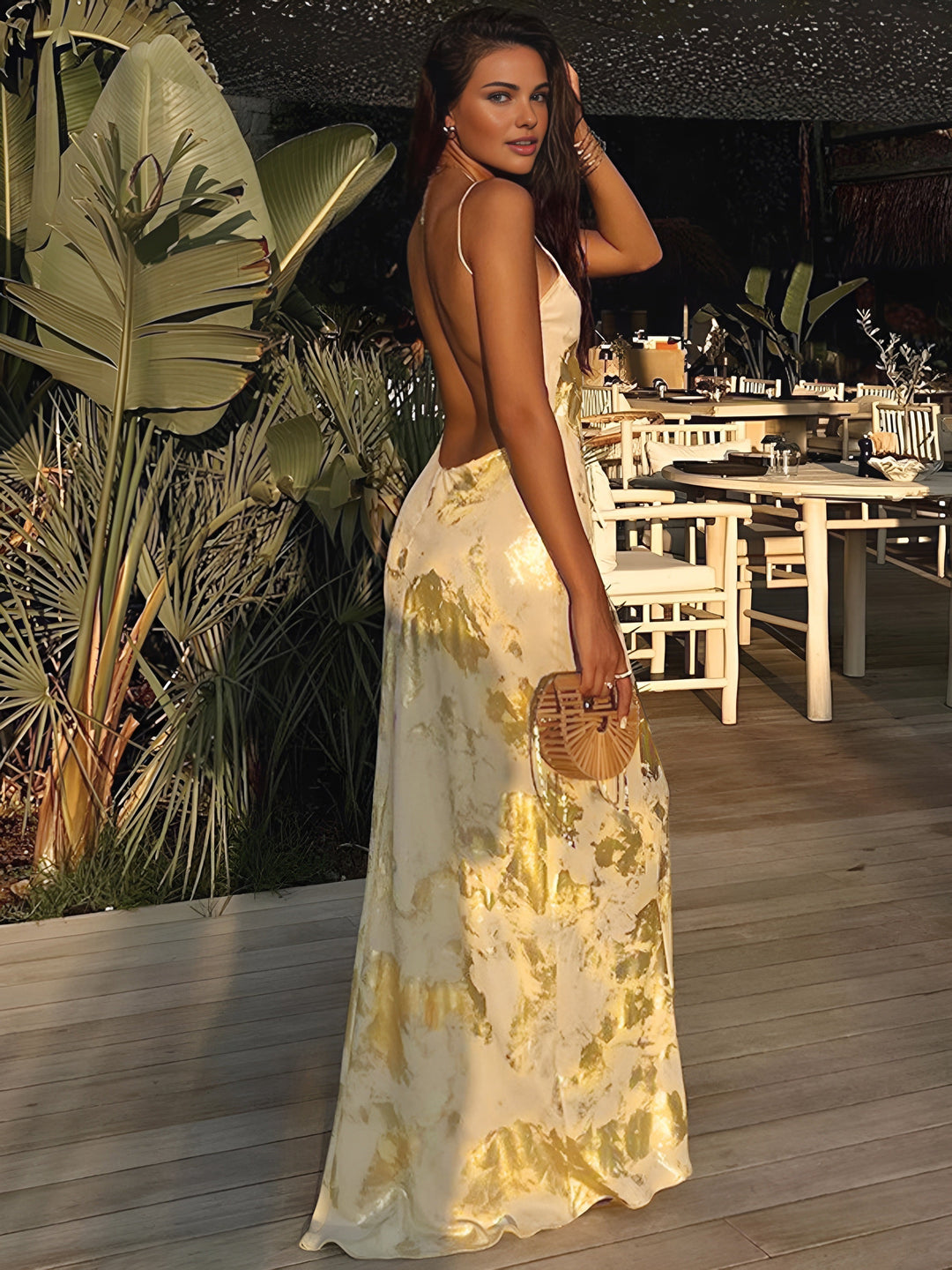 Stylish women's yellow gold floral maxi dress. An elegant occasion wear choice for summer parties or special events.