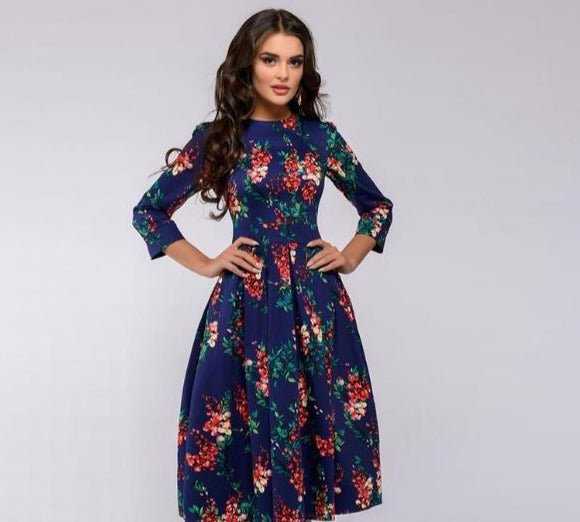 Elegant women's A-line knee-length dress with vibrant floral print, fitted waist, 3/4 sleeves, perfect for spring occasions.