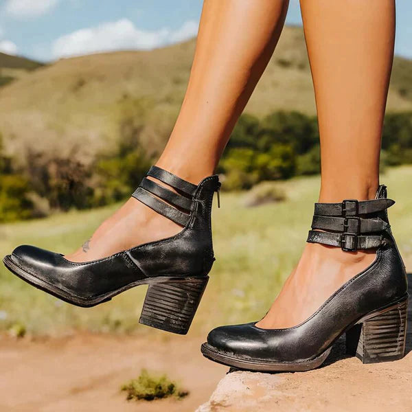 "Elegant women's block heel ankle boots in black, with round toe and back zipper, perfect for chic and comfortable wear."
