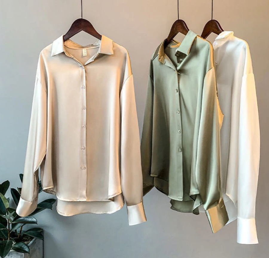 Elegant women's fall blouse in luxurious silk, soft and classic design, perfect for versatile styles and chic silhouettes.