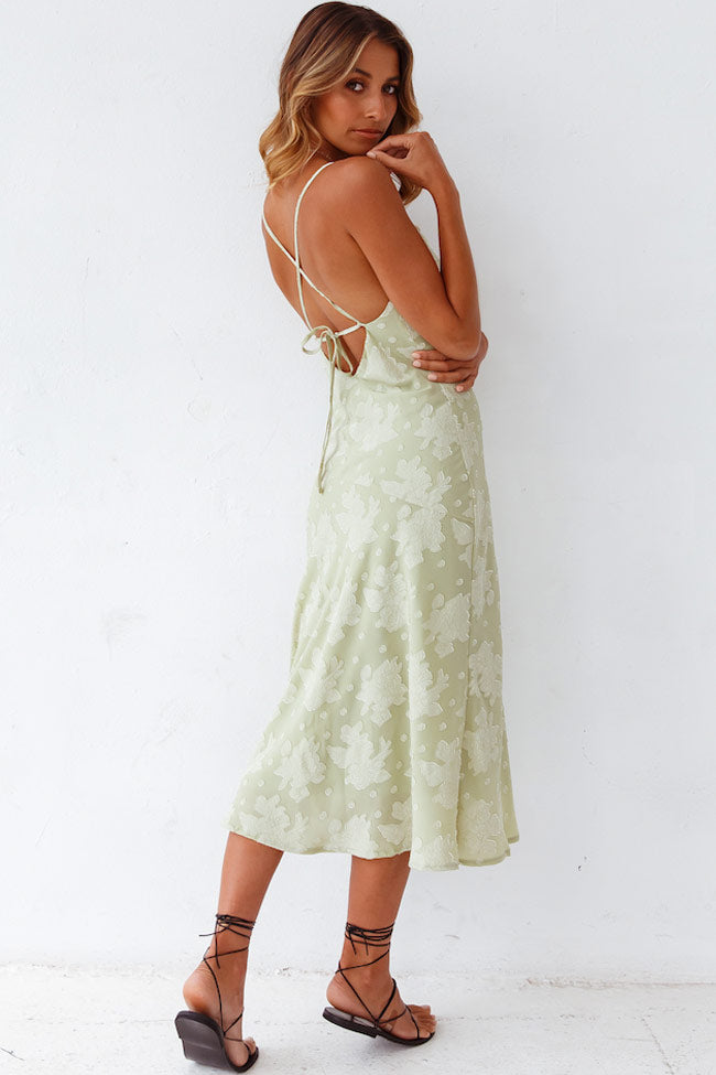 Elegant women's floral slip midi dress with cowl neck and high slit; perfect for evening wear and semi-formal events.
