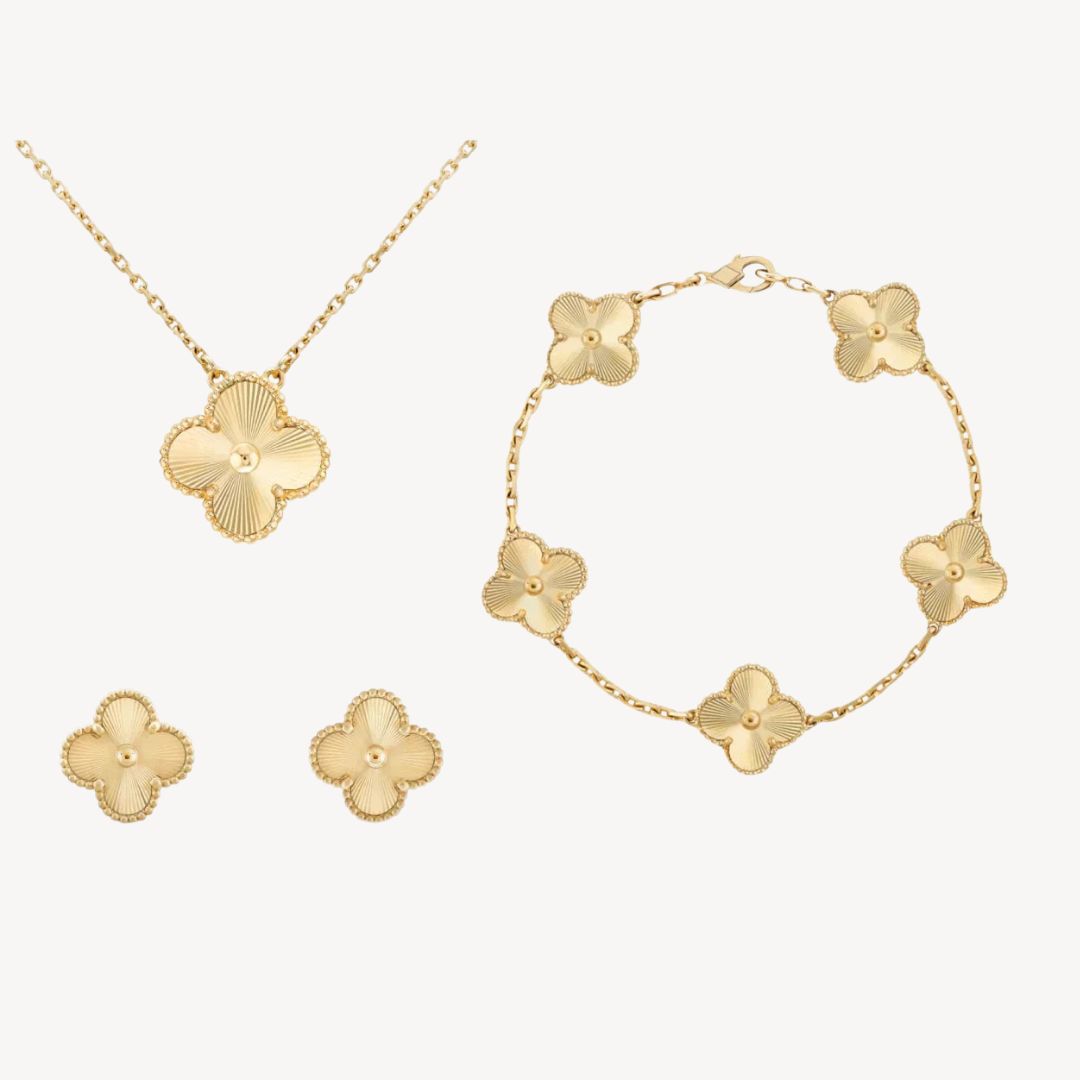 "Elegant Women's Gold-Tone Clover Jewellery Set with Necklace, Bracelet, Earrings; available in multiple colors for a stylish
