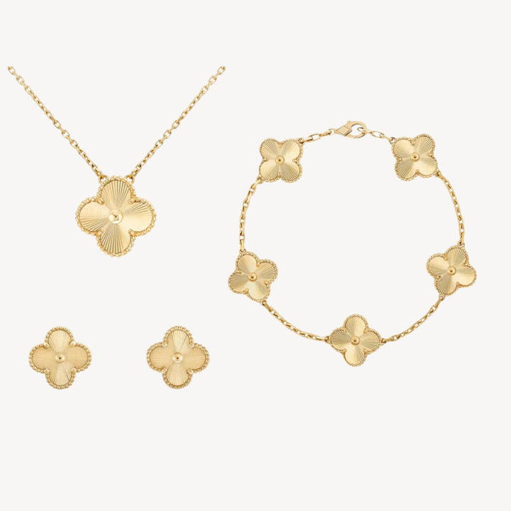 "Elegant Women's Gold-Tone Clover Jewellery Set with Necklace, Bracelet, Earrings; available in multiple colors for a stylish