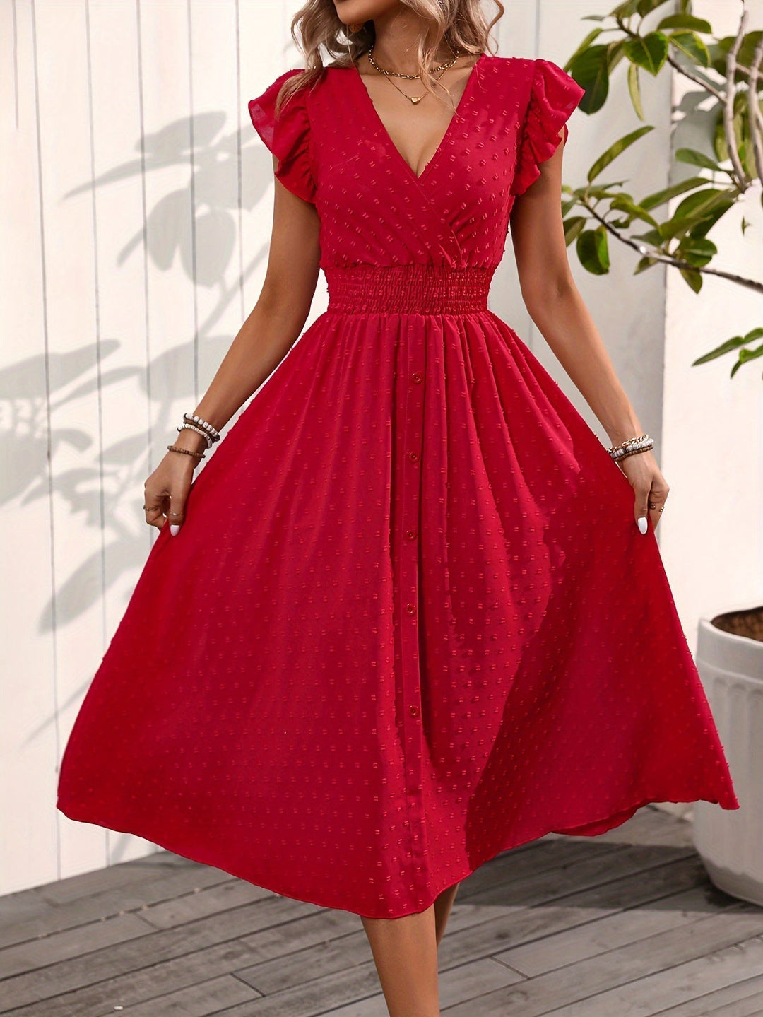 "Elegant Women's V-Neck Midi Dress with ruffle sleeves, smocked waist, dotted pattern, button-down front for casual style."