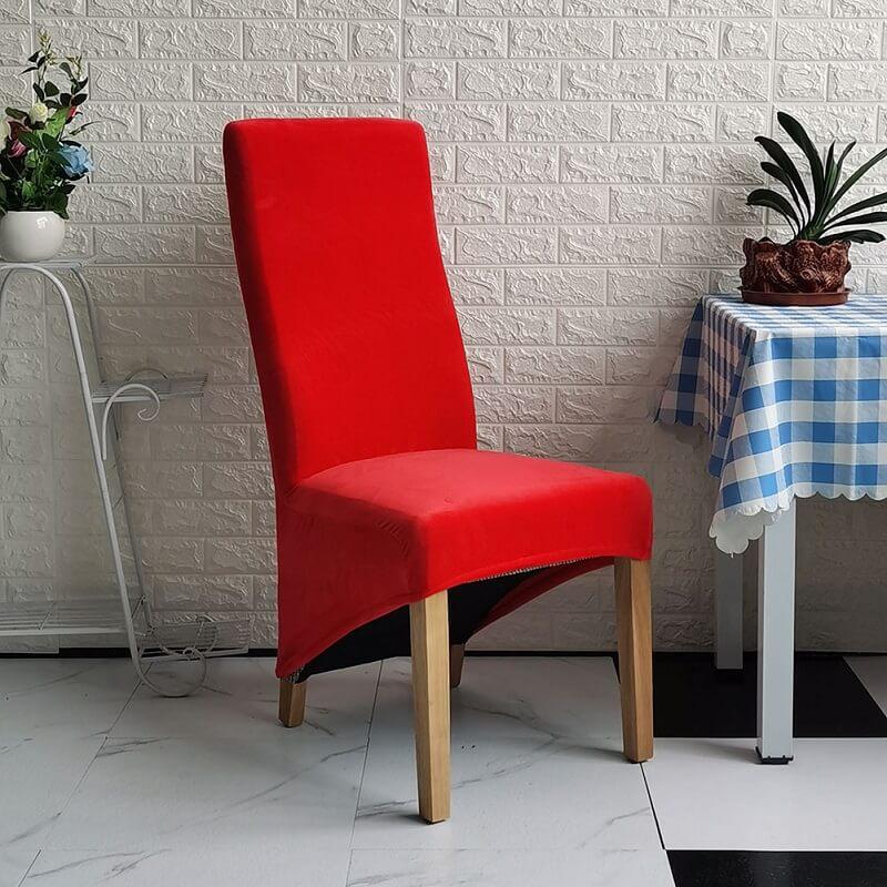 Elegant XL stretch velvet dining chair cover in camel, showcases plush velvet texture, ideal for home or events, fits armless chairs.