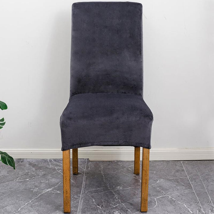 Elegant XL stretch velvet dining chair cover in camel, showcases plush velvet texture, ideal for home or events, fits armless chairs.