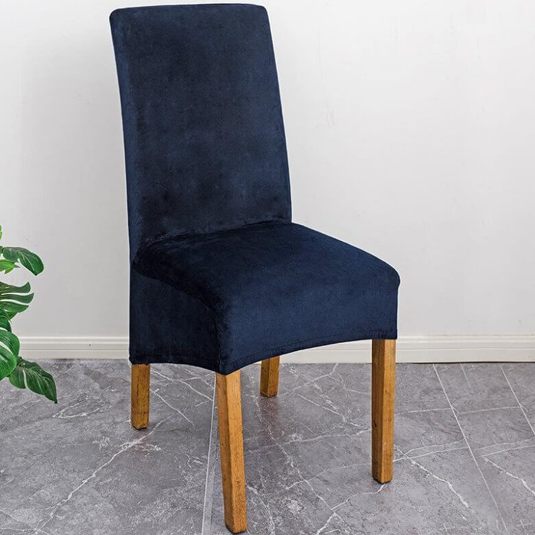 Elegant XL stretch velvet dining chair cover in camel, showcases plush velvet texture, ideal for home or events, fits armless chairs.