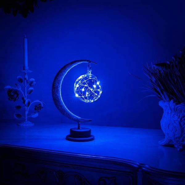 Enchanting LED Moon Lamp, a decorative night light creating ambient mood lighting for a celestial-themed room aesthetic.