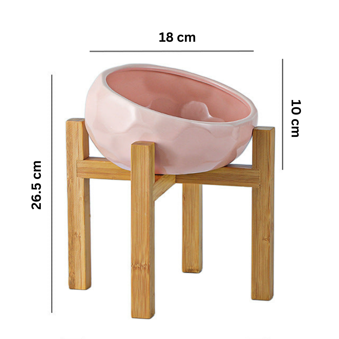 "Ergonomic elevated pet bowl with non-slip wooden stand, sleek design, blue color, enhances pet comfort and posture."
