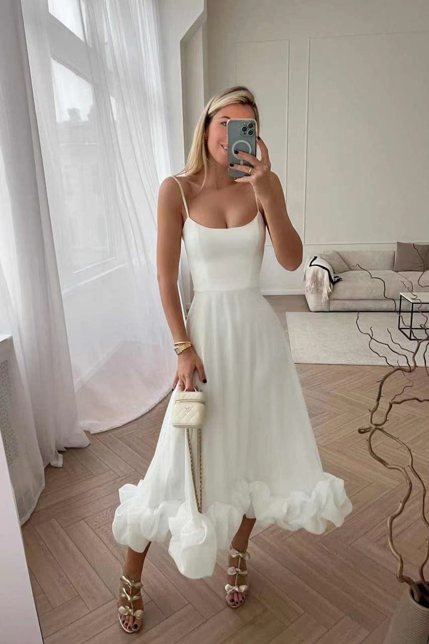 "Exquisite women's midi dress with 3D floral embellishments, A-line silhouette, sleeveless bustier top, ideal for events."