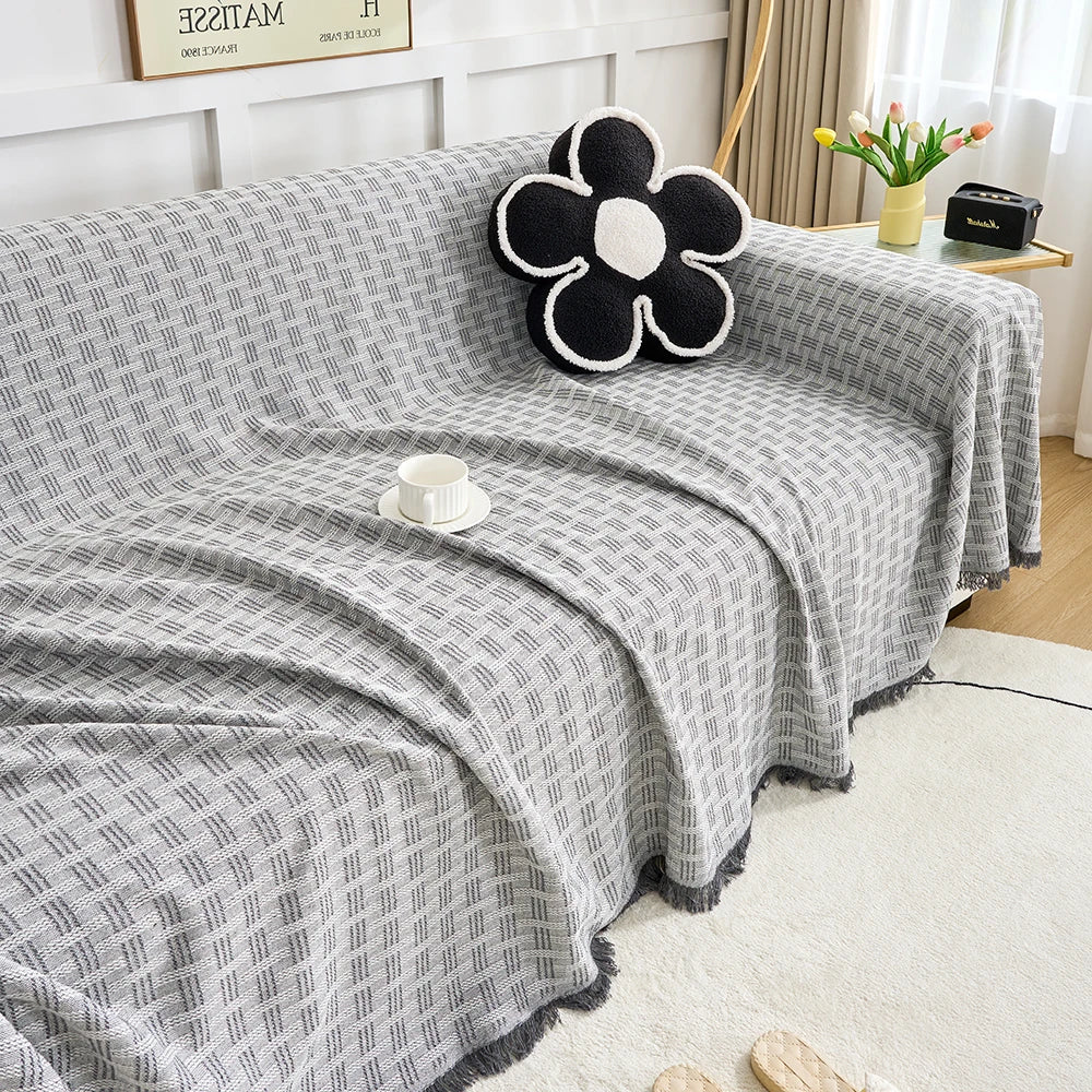 Extra large reversible couch cover in a stylish grey, protecting sofas from pets & spills. Machine washable for easy care.