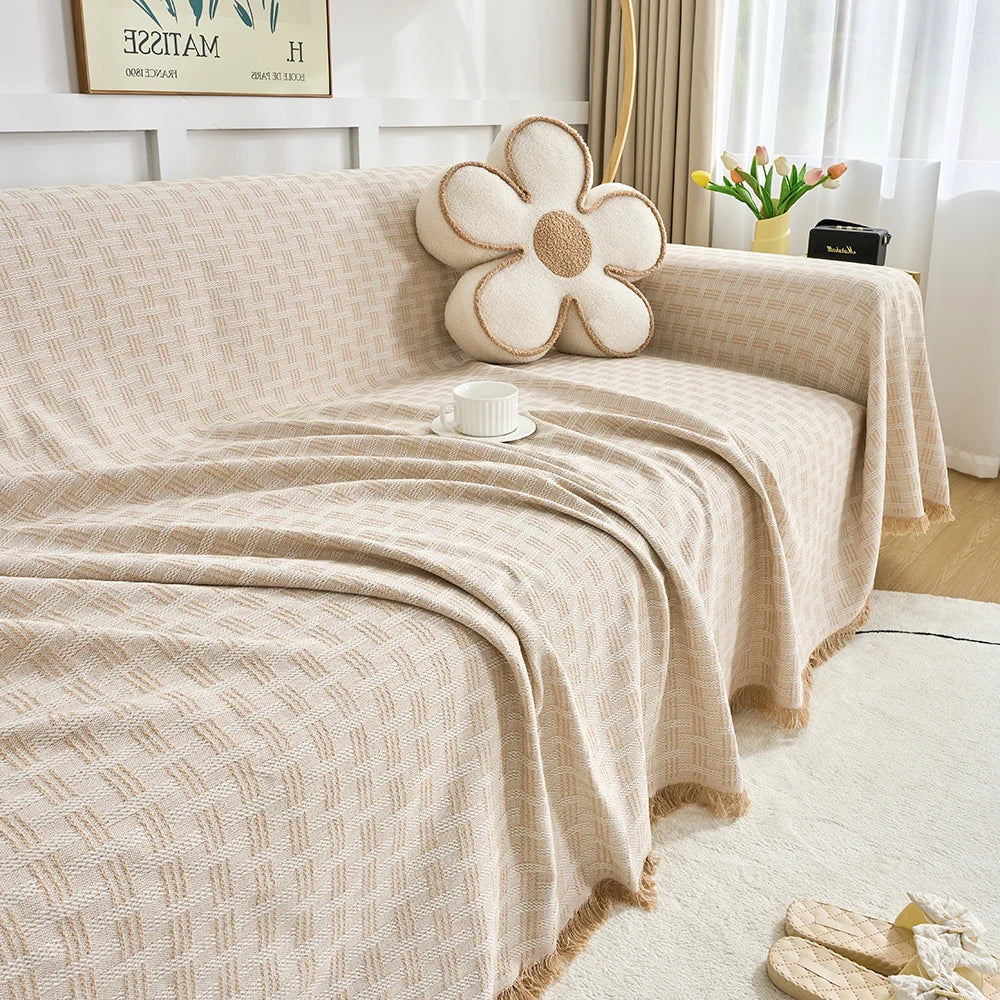 Stylish extra large sofa cover with a reversible design, perfect for updating living room decor & protecting furniture.