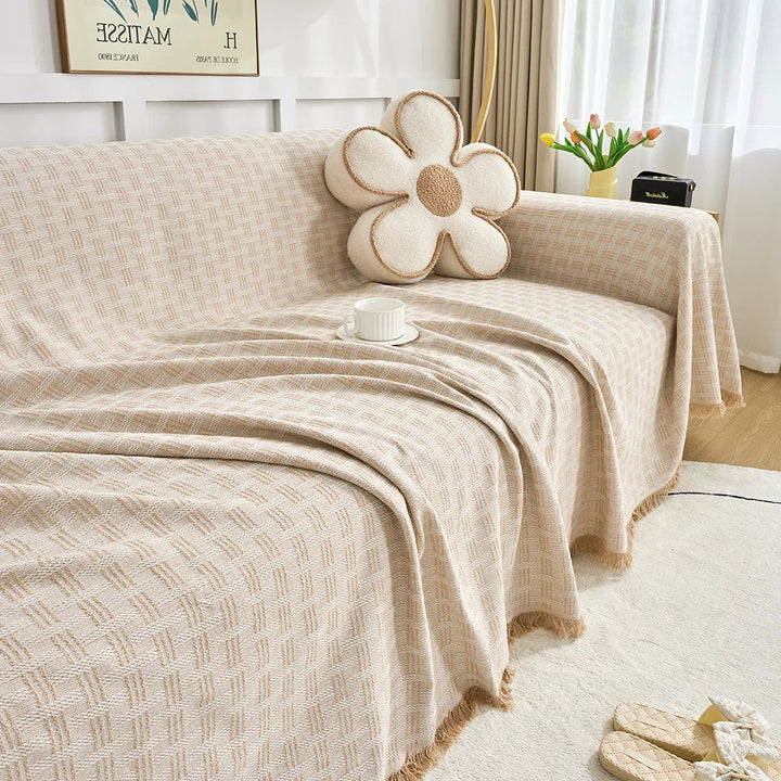 Stylish extra large sofa cover with a reversible design, perfect for updating living room decor & protecting furniture.