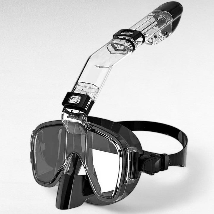 Foldable snorkel mask with 180° view, clear lenses, dry top system for easy breathing, ideal for underwater exploration.