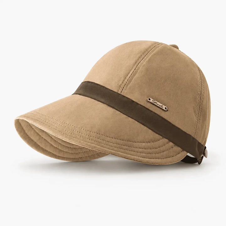 Essential women's foldable beach hat. Wide brim, UPF 50+ UV protection, perfect for summer travel & sun.