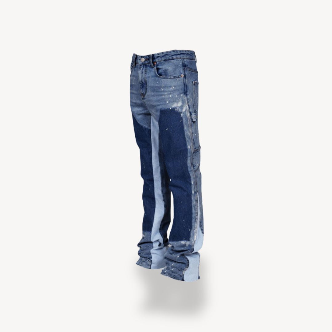 "Front view of men's slim fit stacked jeans in black, gray, blue, showing modern streetwear style and extended leg length."