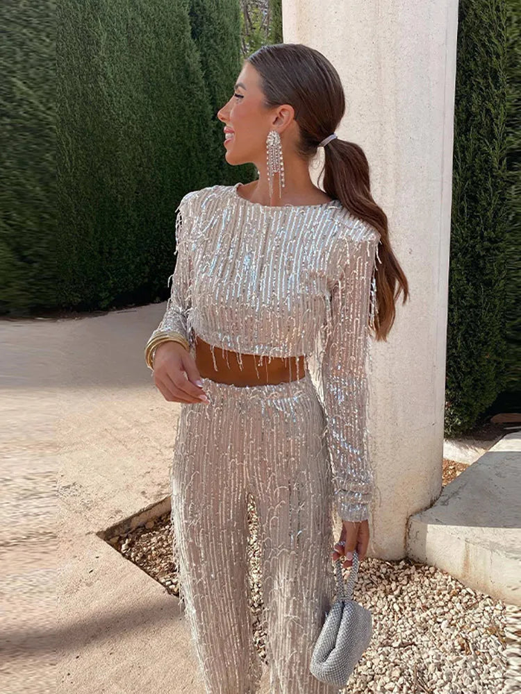 Glamorous women's sequin two-piece set, perfect for parties and special occasions. Sparkle and shine.