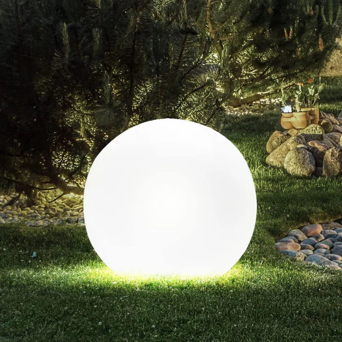 Elegant spherical LED outdoor light, a minimalist design for sophisticated garden & patio decor.