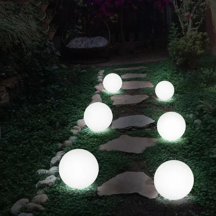 Energy-efficient LED spherical garden light, rechargeable & color-changing for stunning outdoor displays.
