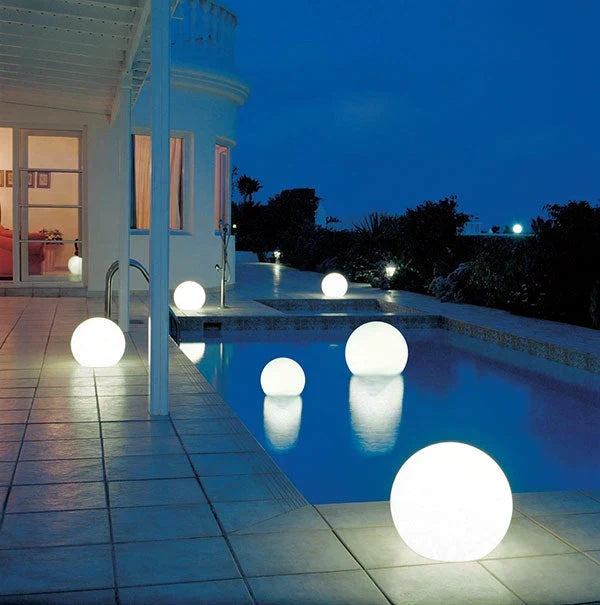 Waterproof spherical LED light, ideal for illuminating poolside areas and creating a relaxing outdoor ambiance.