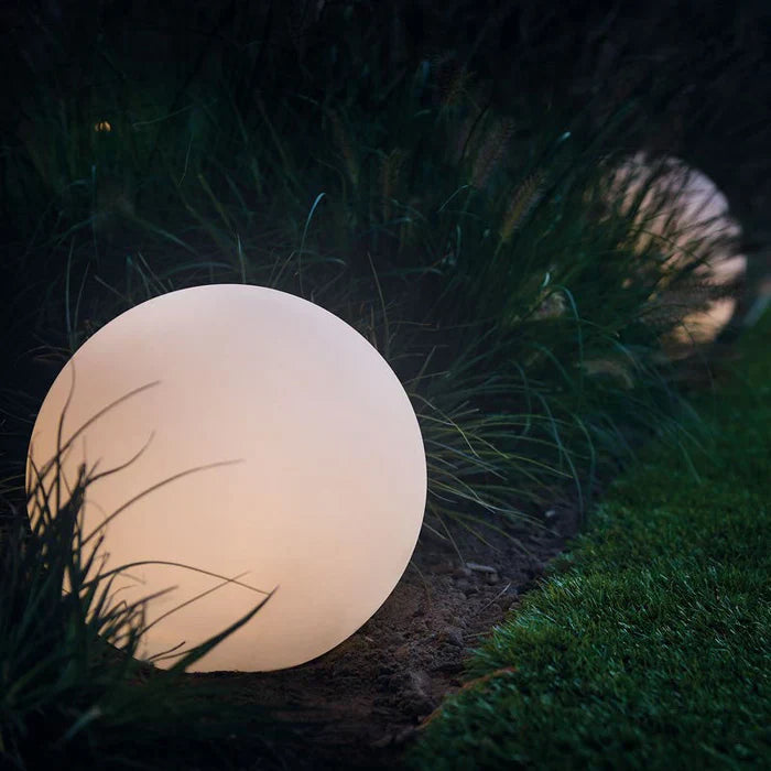 Rechargeable spherical LED garden light, provides wireless waterproof illumination for any outdoor space.