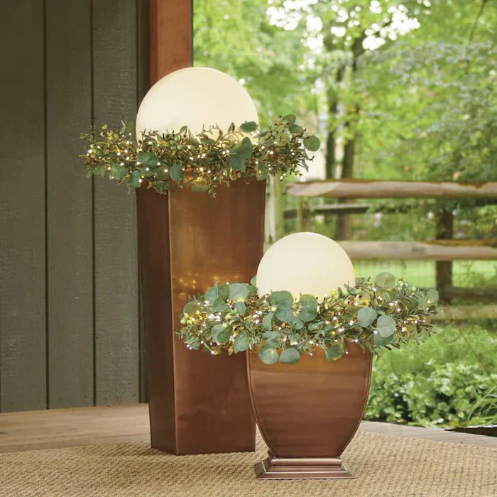 Remote controlled spherical LED light, offering customizable color-changing garden & patio illumination.
