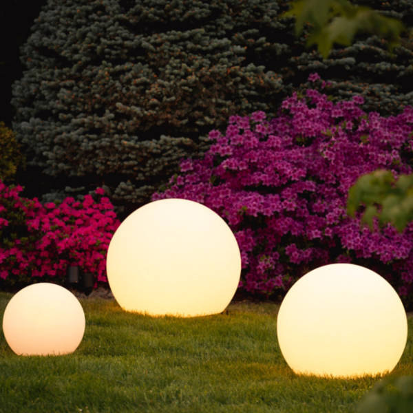 GlowSphere spherical lawn decor light, an elegant waterproof LED accent for your outdoor garden area.