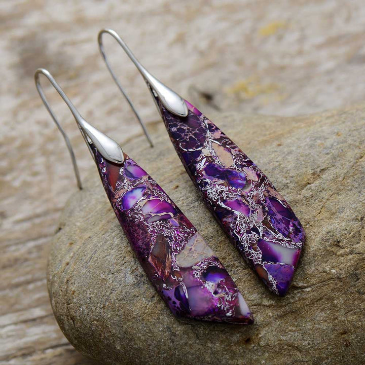Elegant bohemian fashion dangle earrings for women, featuring unique artisan design and colorful drops.